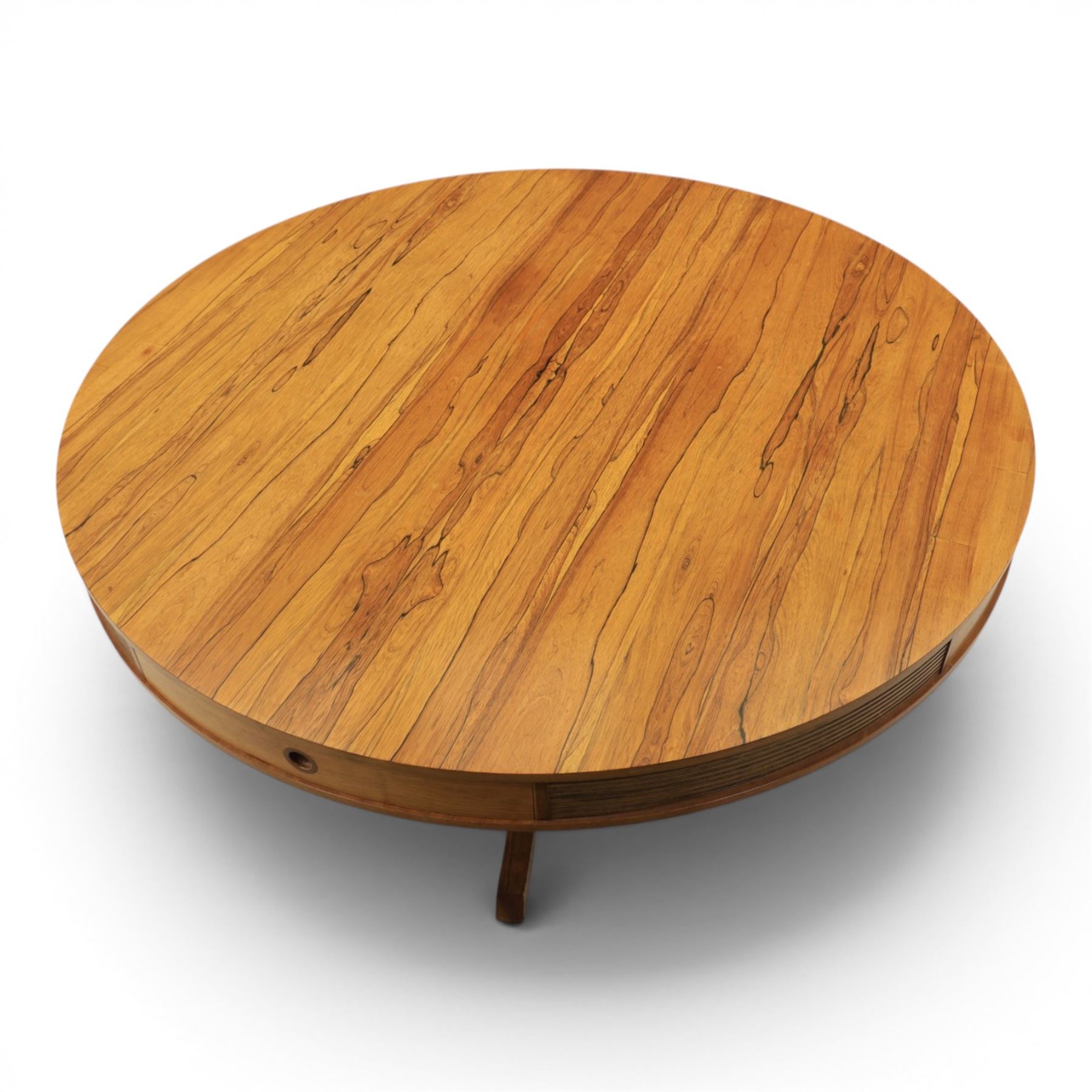 Robert Heritage for Archie Shine - mid-20th century santos rosewood drum table, circular top with four drawers with recessed handles, receded elements, raised on a cylindrical support with three legs