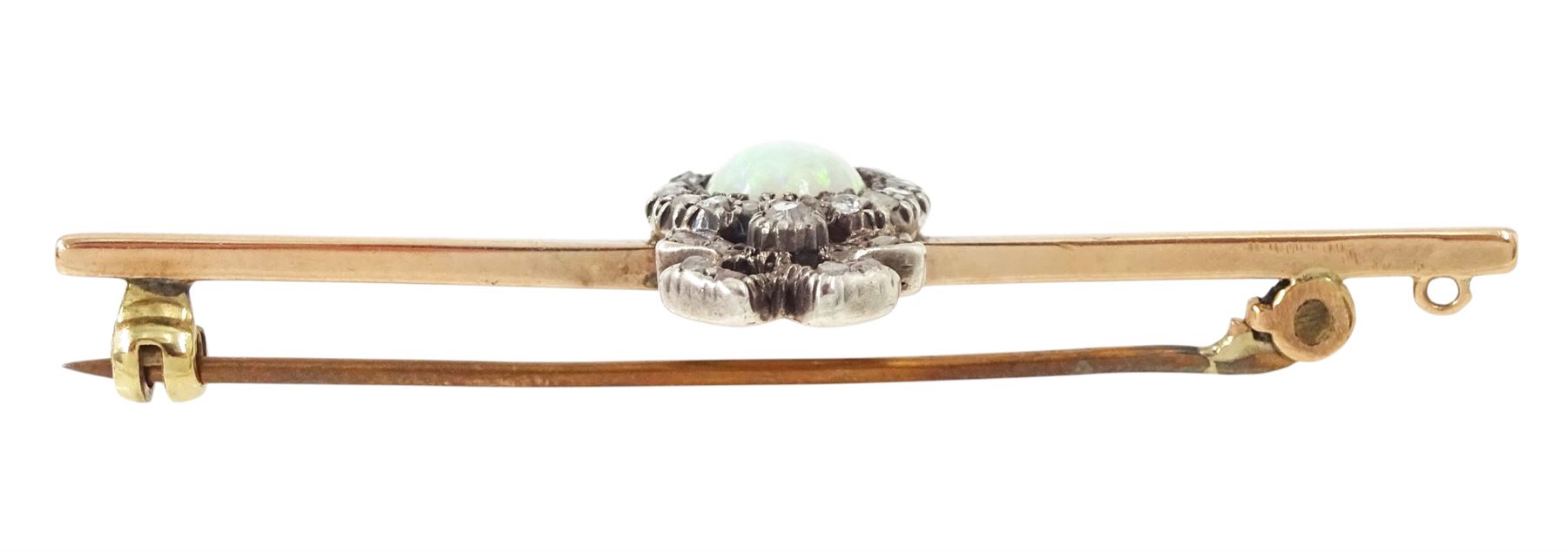 Edwardian gold and silver opal and diamond heart cluster brooch, central oval cut opal surrounded by rose cut diamonds, and surmounted by a diamond set ribbon bow