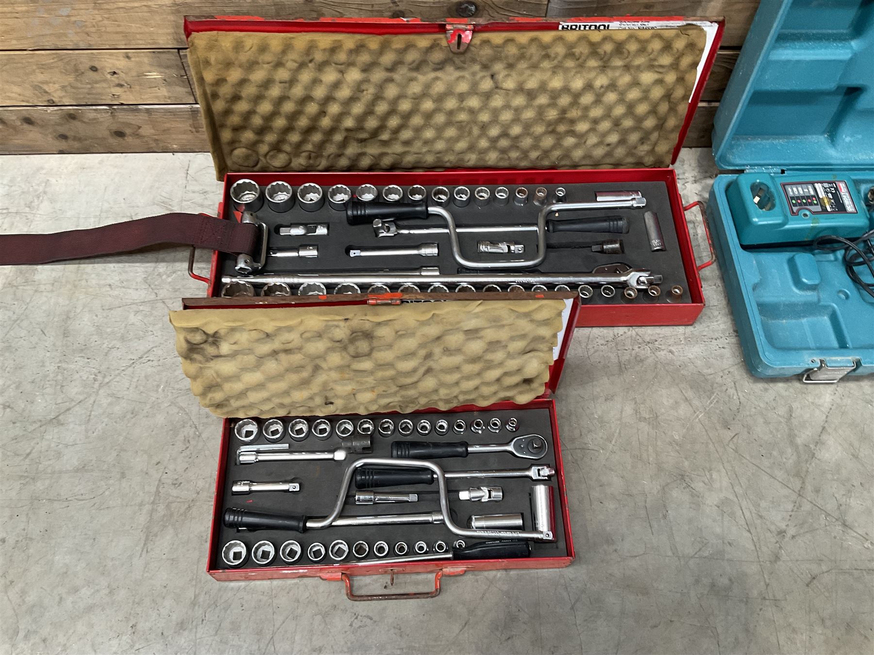 Two Britool socket sets, and two Makita drills