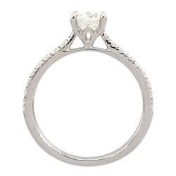 18ct white gold single stone round brilliant cut diamond ring, with diamond set shoulders, hallmarked, principal diamond 0.71 carat, with with International Gemological Institute report