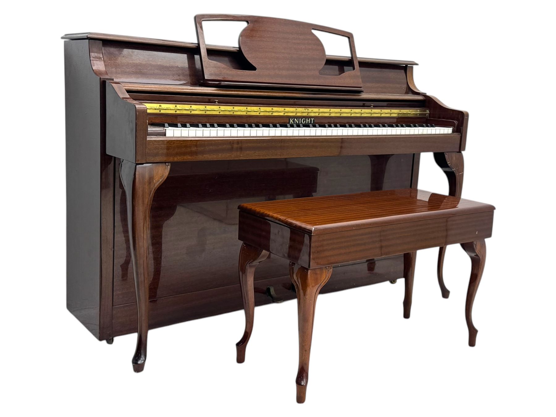 Knight - upright piano in mahogany gloss lacquered case, with stool,  rectangular slide back fall front enclosing full keyboard, with twin brass pedals, cabriole legs 