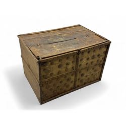 Late 19th century Afghan carved hardwood storage chest, the hinged plank top enclosing large internal storage space, geometric carvings to the front panels decorated with rows of riveted iron bosses