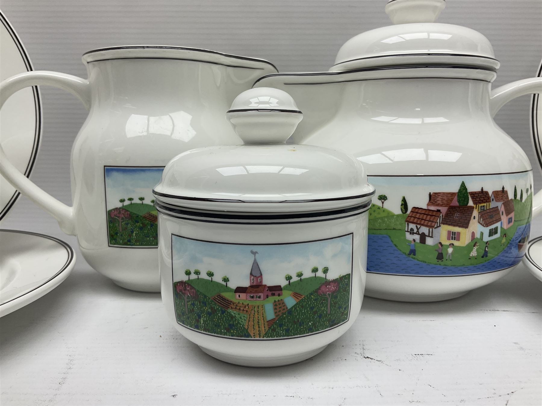 Villeroy and Boch Naif pattern tea service, comprising teapot, jug, covered sucrier, two mugs, two breakfast bowls and four side plates (11)