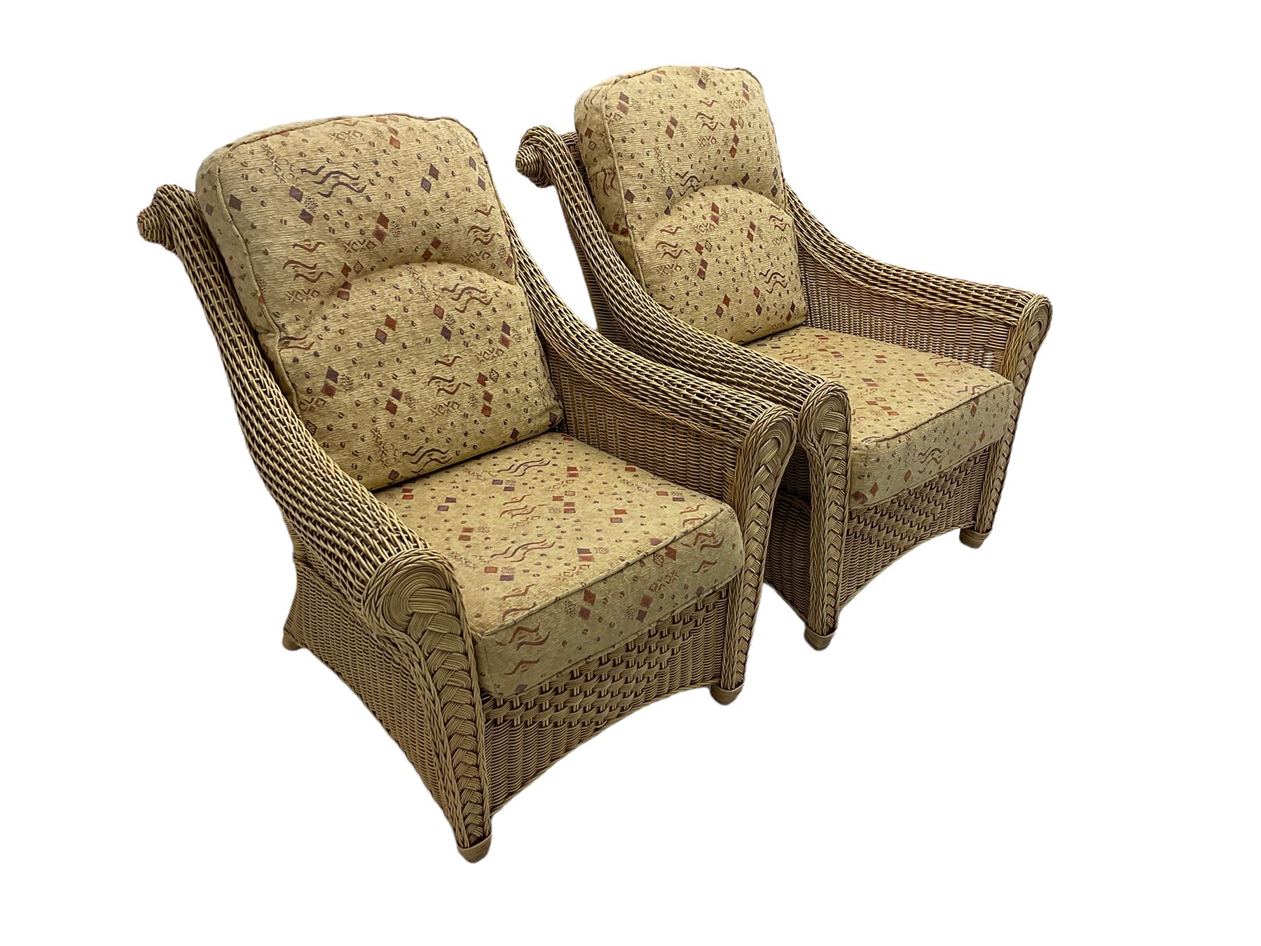 Four piece cane conservatory suite - two seat sofa (W130cm), pair of armchairs (W85cm), and coffee table (85cm x 60cm)