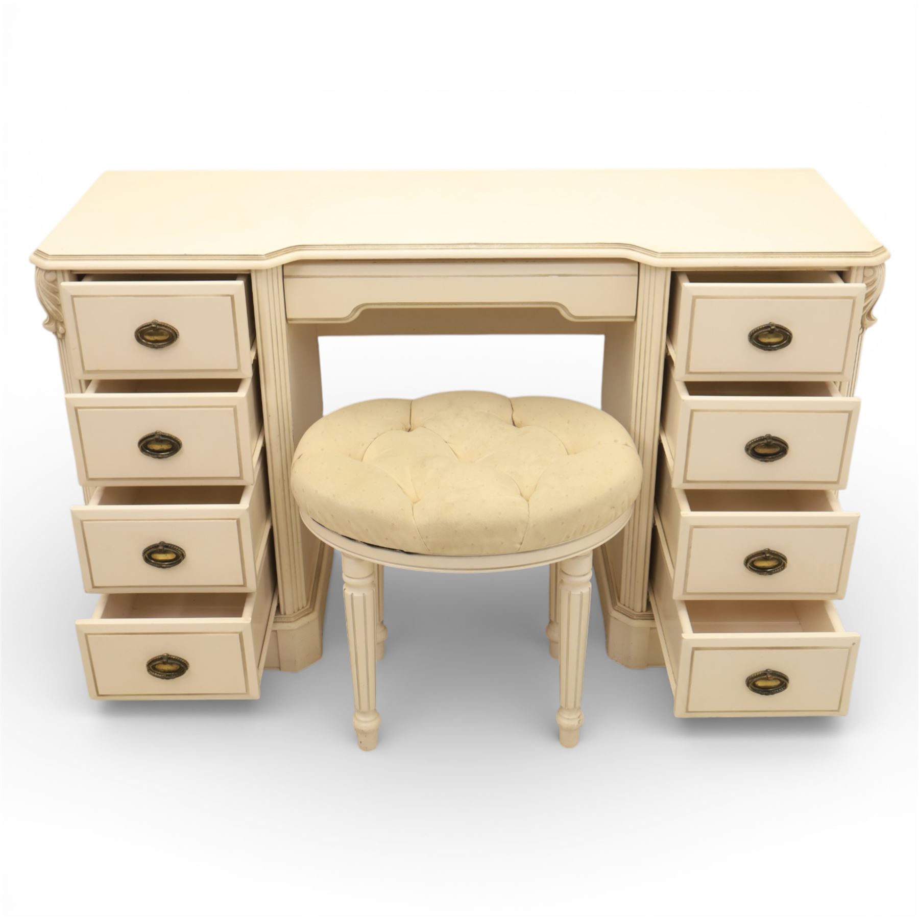 Contemporary French design white painted bedroom suite retailed by Barkers of Northallerton, comprising wide chest fitted with four short and four long drawers with oval brass handles (H 70cm, W 159cm, D 46cm), pair of bedside chests each fitted with three drawers (H 62cm, W 40cm, D 46cm), dressing table fitted with four short drawers and central kneehole with shaped apron (H 79cm, W 131cm, D 46cm) with matching framed wall mounted mirror (H 100cm, W 113cm), and full length standing mirror (H 175cm, W 73cm)