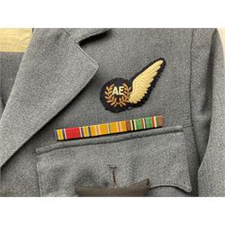 Two post-WWII British Army No.2 Dress tunics, one with Green Howards buttons; army shirt dated 1951; Royal Fleet Auxilliary jacket with trousers; three RAF/WAAF uniforms and RAF Greatcoat; and three canvas/webbing bags, two dated 1943 & 1945