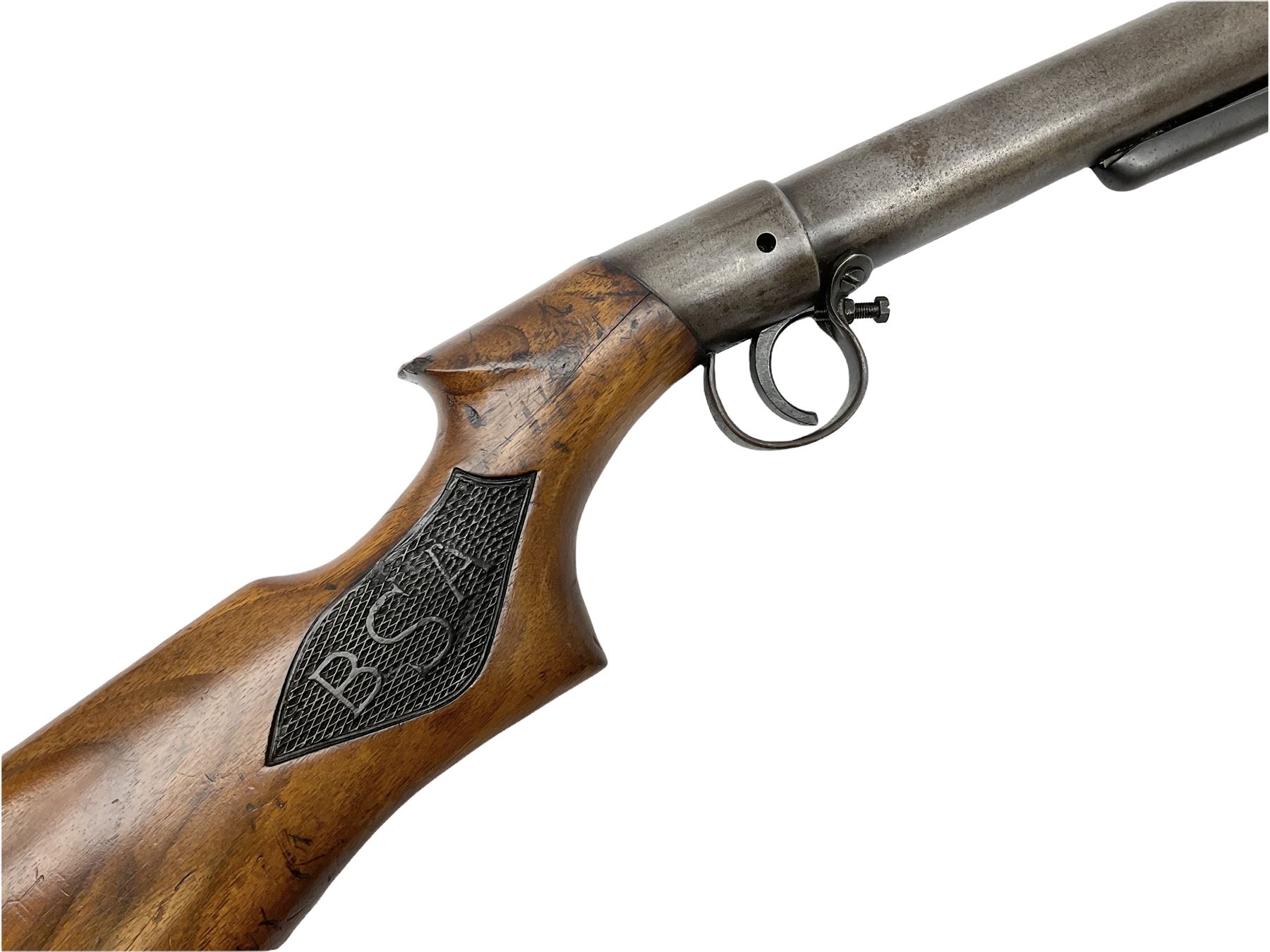 BSA .177 air rifle with top loading under lever action, walnut stock carved with chequered BSA logo to grip, serial no.A1203 L102cm