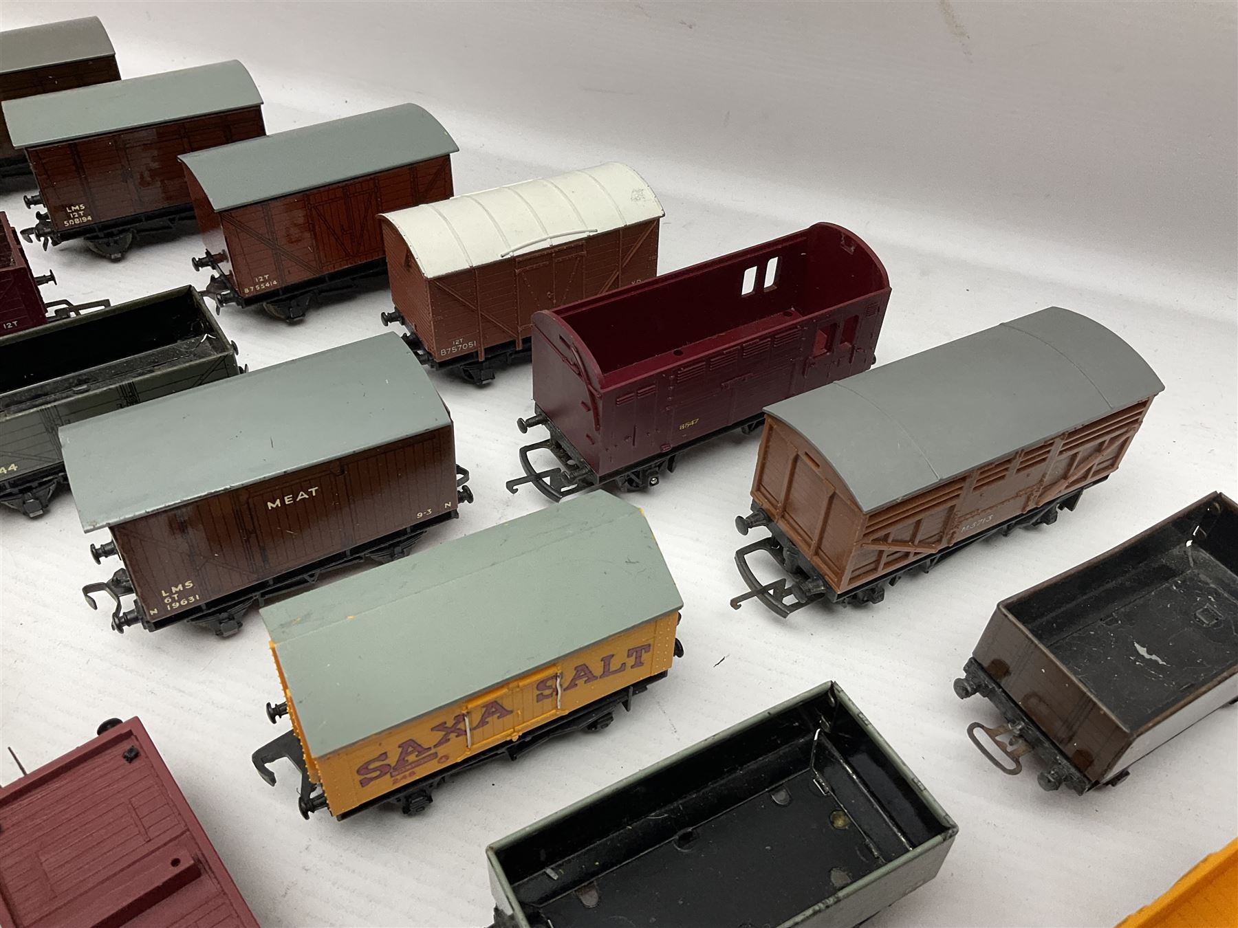 Hornby Dublo - forty-three goods wagons including nine tank wagons (Esso, Mobil, Vacuum, UD and Traffic Services), brake vans, meat and fish wagons, bogie well and bolsters, cable drums, open wagons, salt and grain wagons, etc; and six others by Tri-ang etc; all unboxed (49)