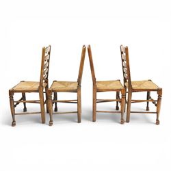 Set of eight country ladderback chairs (6+2), shaped ladderback over a rush seat, raised on turned supports, united by stretchers