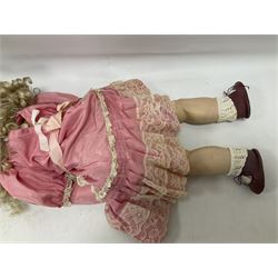Reproduction Simon & Halbig bisque head doll with applied hair and jointed limbs; marked Simon & Halbig 117, H58cm