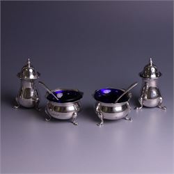 Early 20th Century four piece silver cruet set, comprising a pair of pepper shakers and a ...