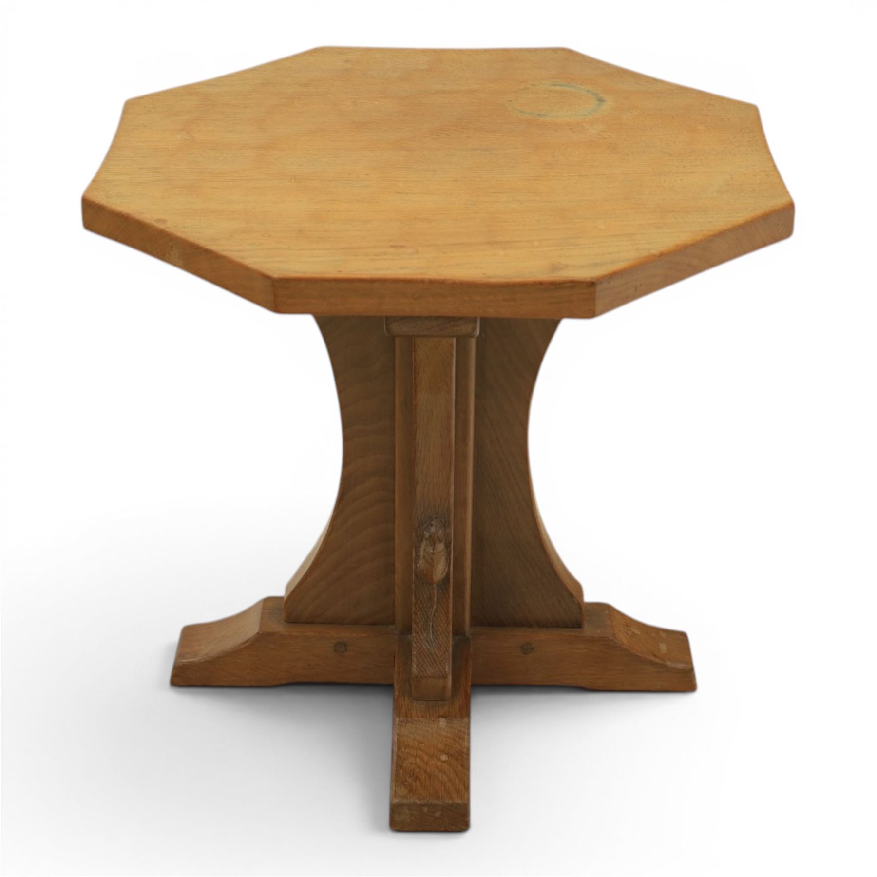 Mouseman - adzed oak octagonal occasional table,  raised on a quatriform base with carved mouse signature, by the workshop of Robert Thompson, Kilburn
