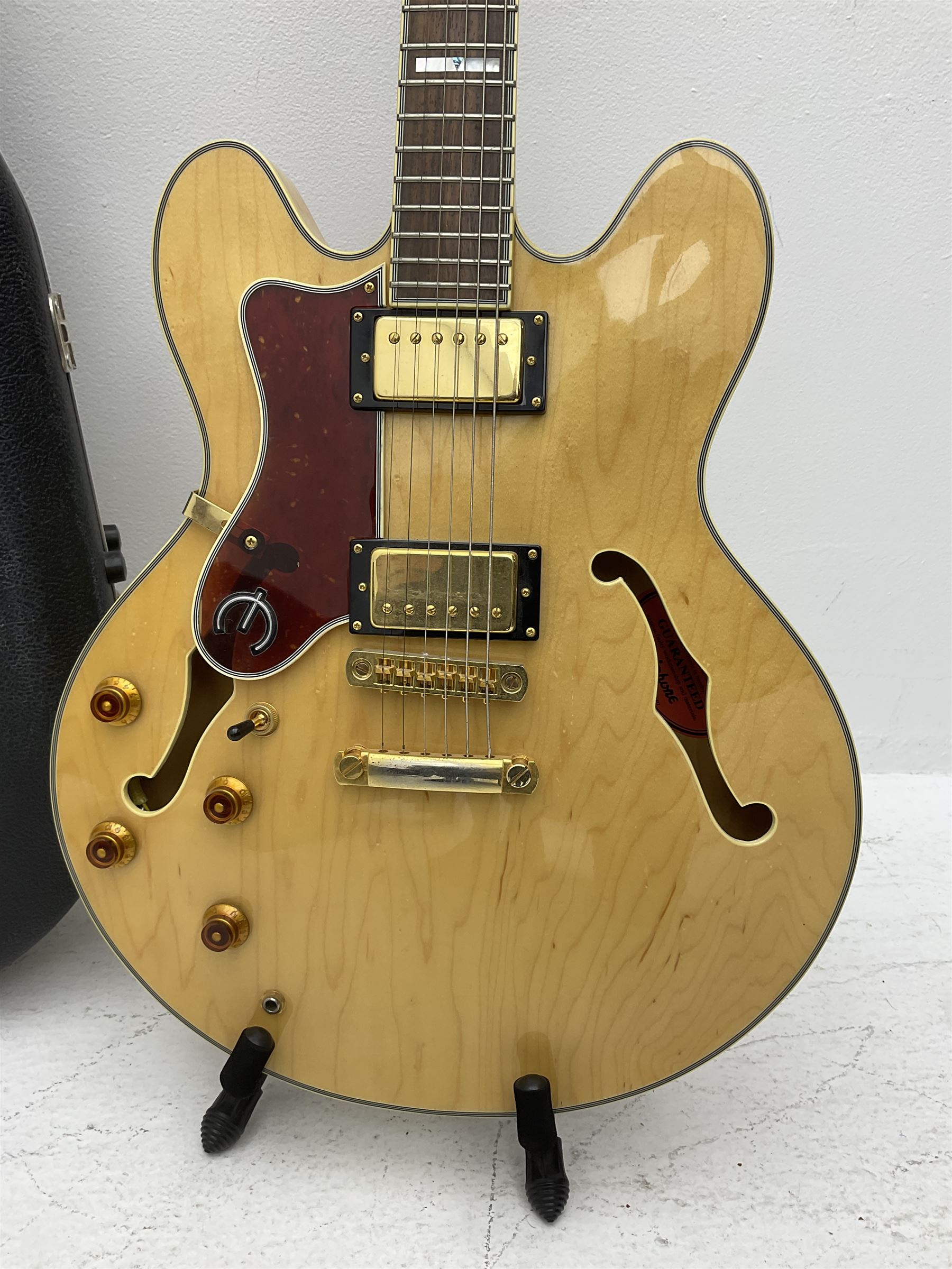 Late 1990s Epiphone Sheraton left handed hollow body electric guitar by Gibson, serial no.99090334, bears label 'Made in Korea', L103cm, in Hiscox fitted hard case; with Squier SP-10 amplifier and XCG folding guitar stand (3)