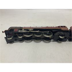 Hornby ‘00’ gauge - four steam locomotives comprising Britannia Class ‘Britannia’ 4-6-2 no.70000 in BR green; Britannia Class ‘Oliver Cromwell’ 4-6-2 no.70013 in BR green; Princess Class 4-6-2 no.6201 in LMS crimson; Coronation Class ‘Duchess of Sutherland’ 4-6-2 no.6233 in LMS crimson; one further tender (5) 