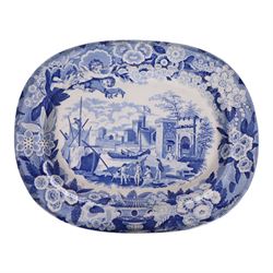 Two 19th century blue and white transfer printed pottery meat plates, the first by Don Pottery decorated in the Port of Alicata Italian and Sicilian views pattern, L38cm the second decorated in a Wild Rose type pattern variant, L37.5cm