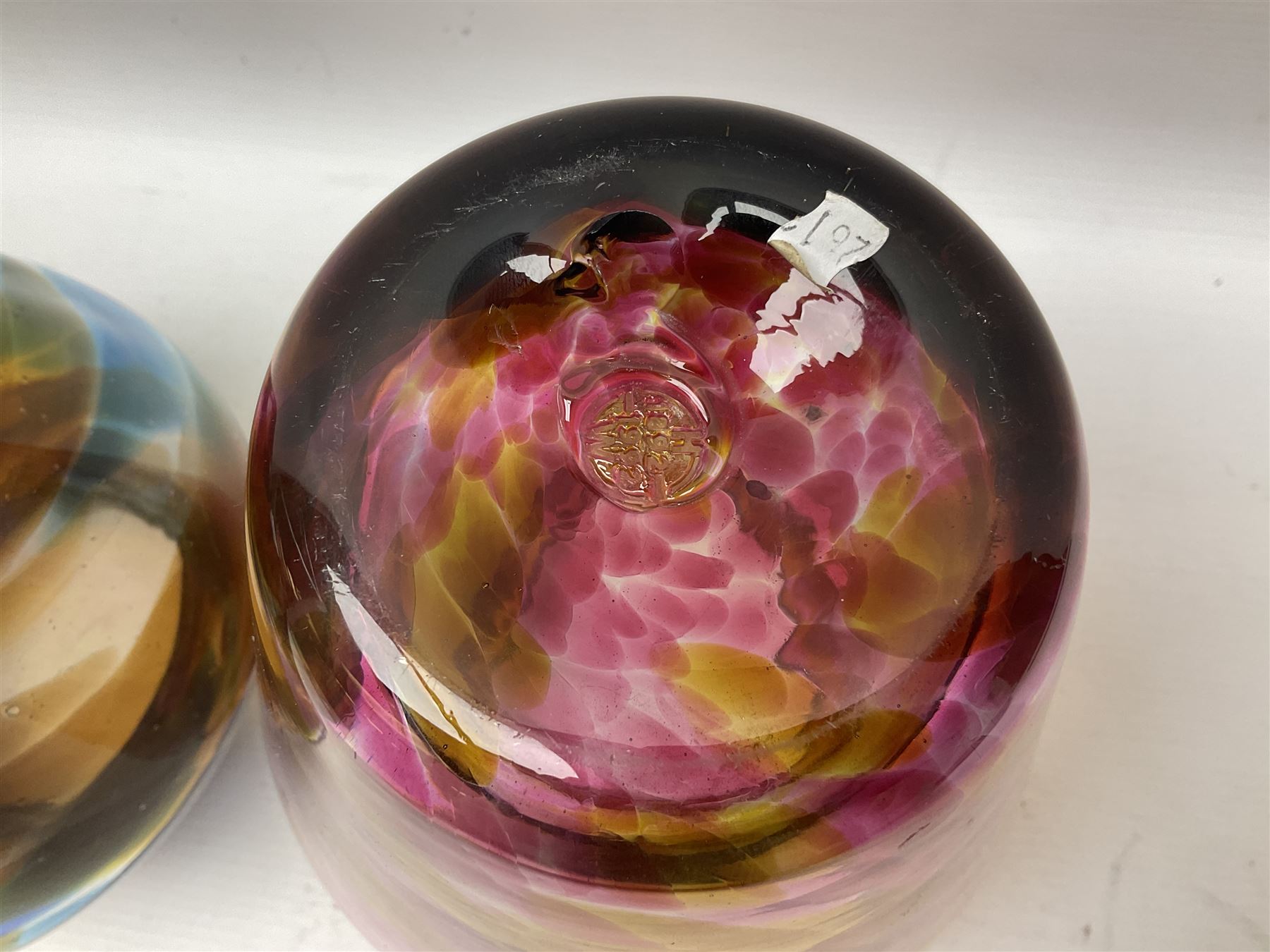 Three Hartley Wood coloured glass vases, each of baluster form with swirling decoration, tallest H21cm
