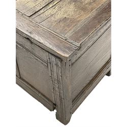 18th century oak blanket box, four panel hinged lid over triple panelled front, moulded frame, on stile supports 