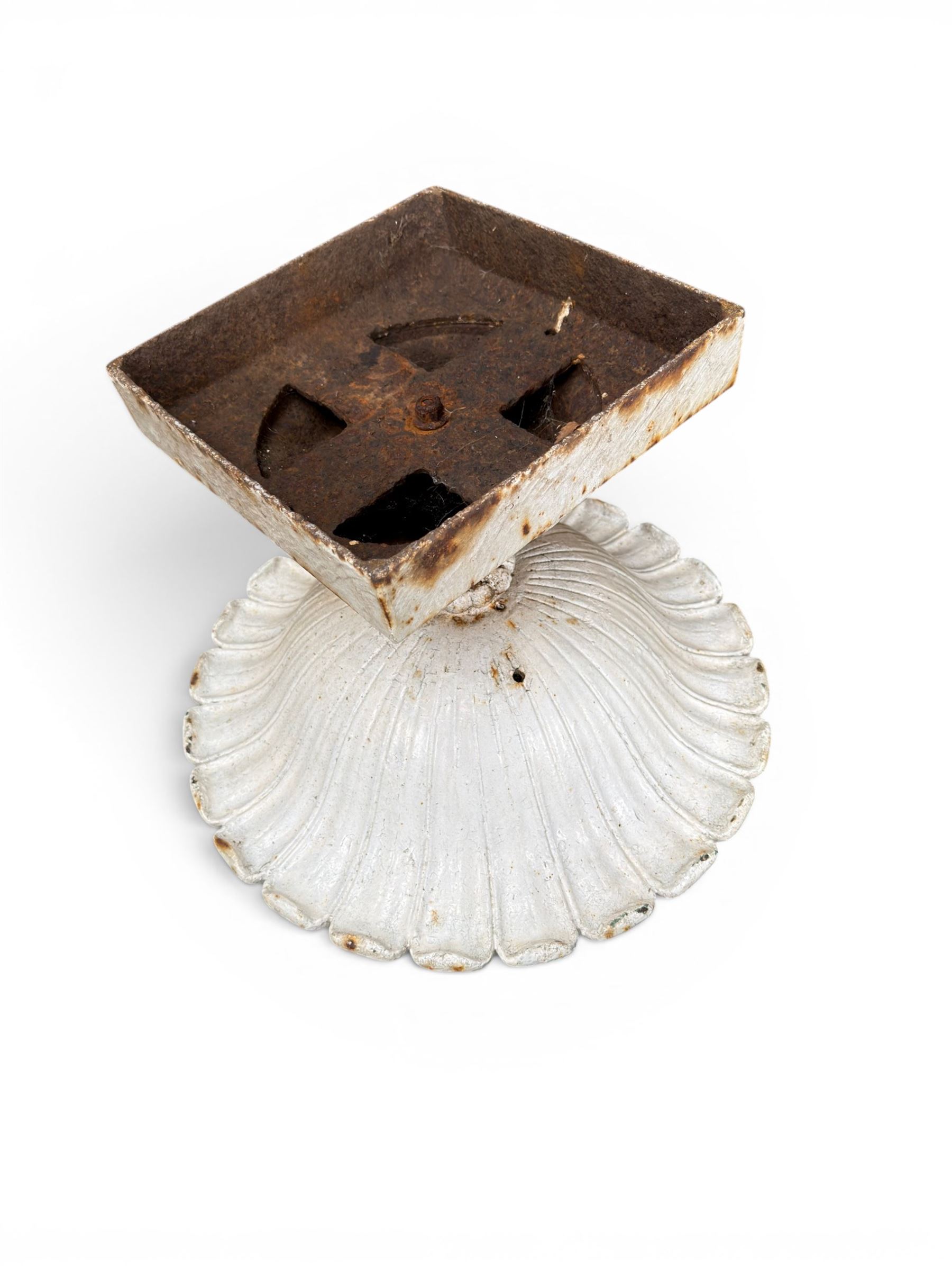 Coalbrookdale - pair of 19th century cast iron petal rim urns, squat form on square plinth, finished in distressed white paint, design registration number 133334, first registered 19 september 1860, number 19 in the Coalbrookdale Castings Catalogue (see illustration)