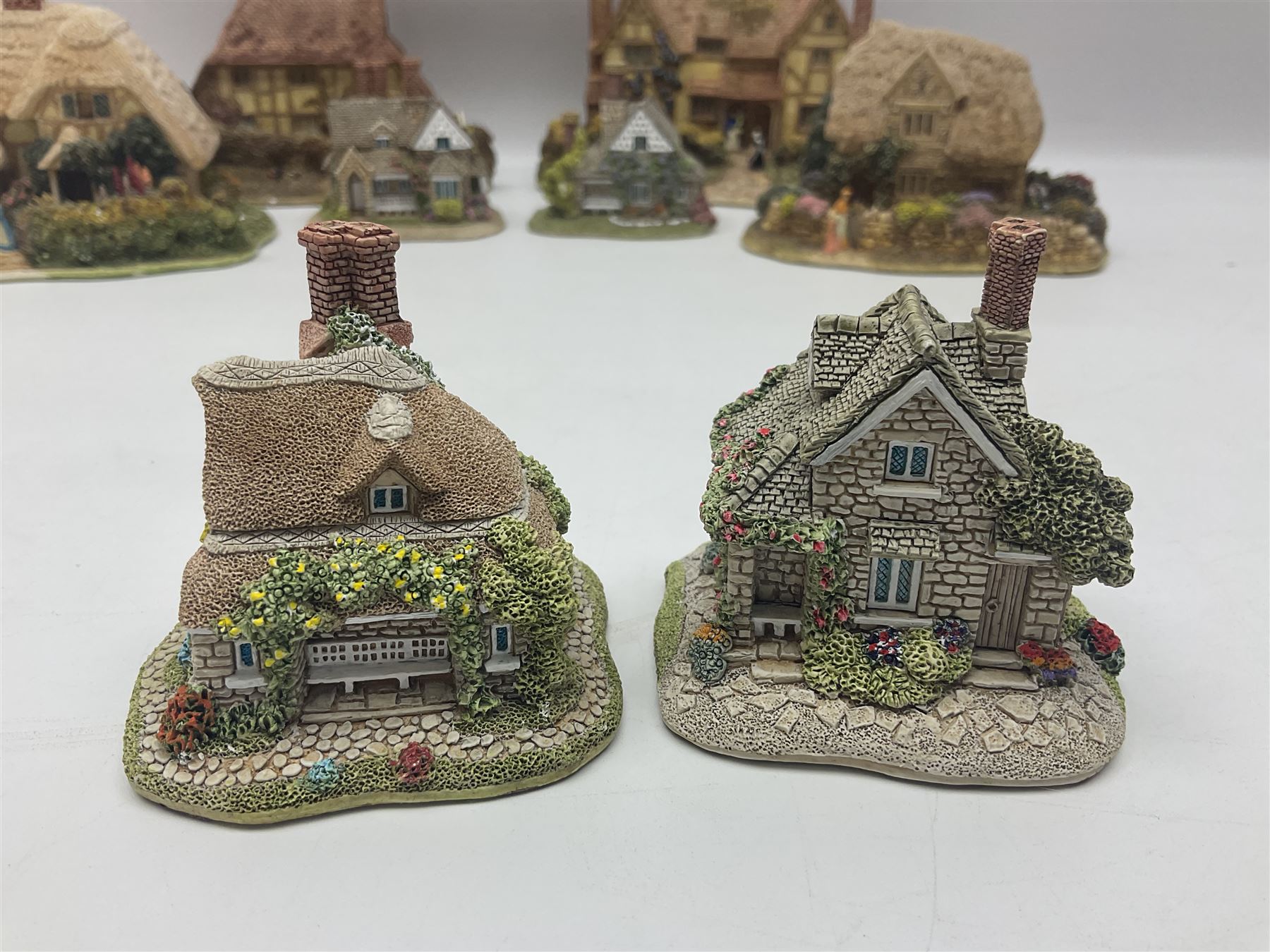 Twelve Lilliput Lanes, including the full Helen Allingham Collection, Chalfont St  Giles, Midhurst, Great Wishford and Witley and from the Blaise Hamlet Classics Collection, Circular Cottage, Dial Cottage, Double Cottage etc, all with original boxes 