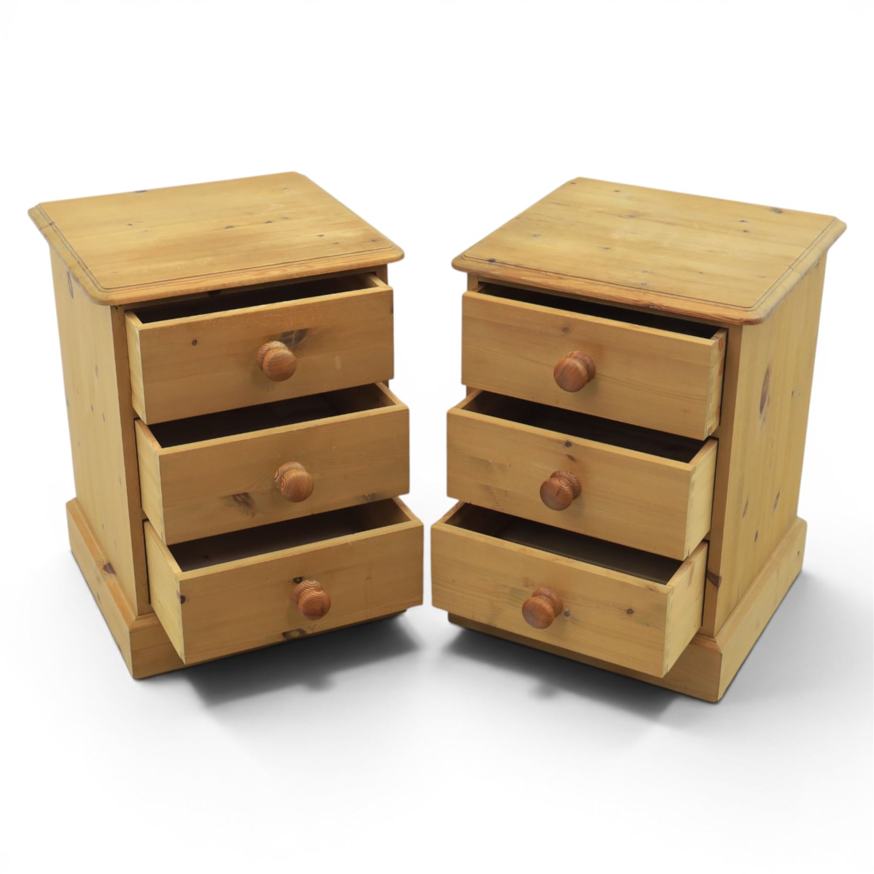 Pair of solid pine three drawer bedside pedestal chests