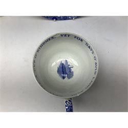 Spode blue and white cup in the Italian pattern with Auld Lang Syne text to rim, together with three Italian pattern Spode shallow bowls, all with black printed mark beneath, largest D29cm