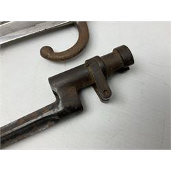French model 1866 sabre bayonet, the 57.5cm curving blade marked St. Etienne 1873; in associated steel scabbard L71cm; and Mosin-Nagant M1891 socket bayonet with 43cm cruciform blade No.37068 (no scabbard) (2)