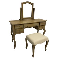 Washed solid oak kneehole dressing table fitted with five  drawers with matching freestanding mirror and stool