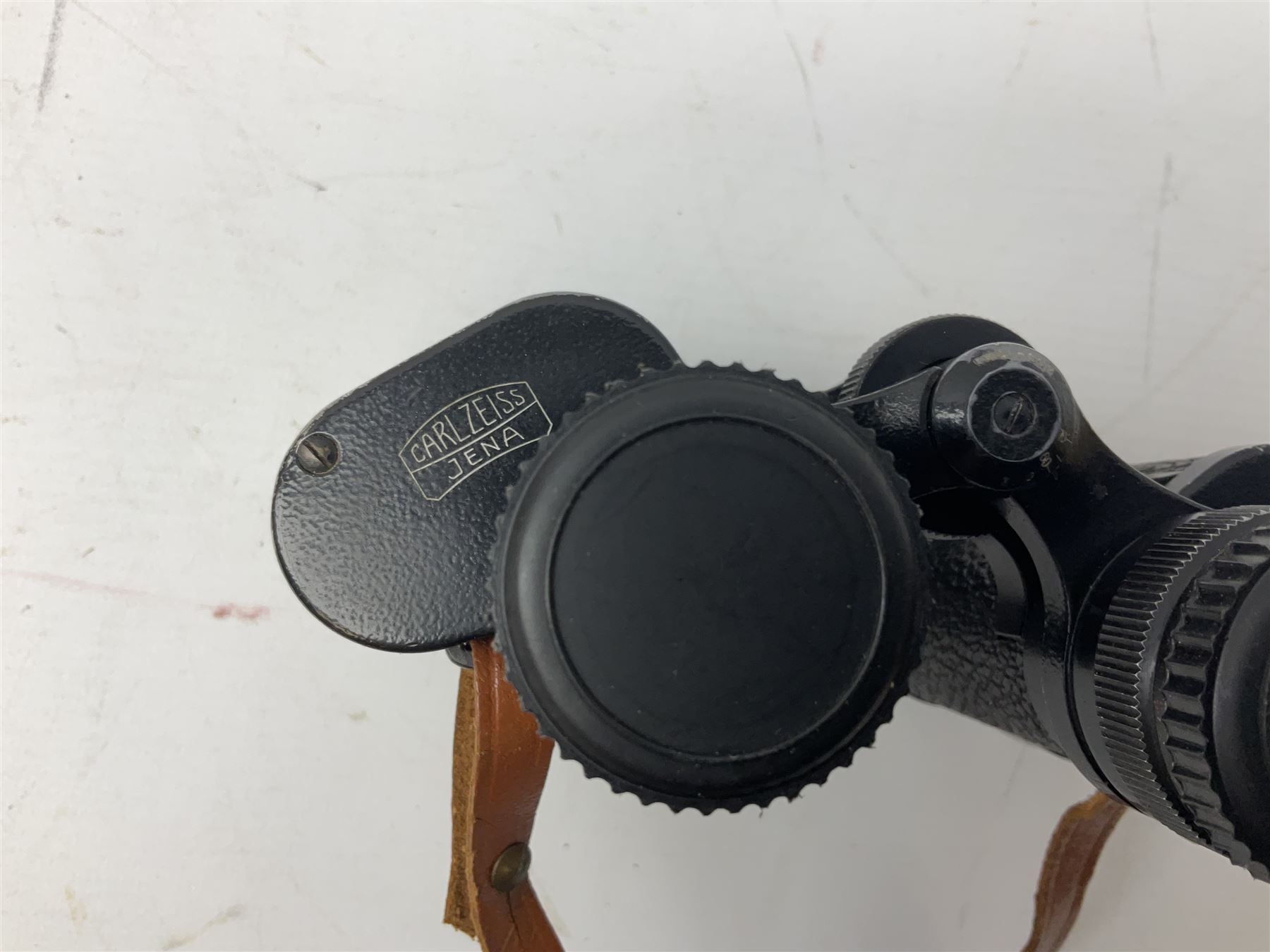 Three pairs of Carl Zeiss Jena binoculars, Jenoptem 10x50W, Jenoptem 8x30W and Deltrintem 8x30W, all cased (3)