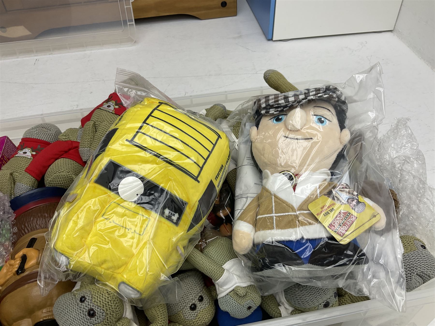 Only Fools and Horses stuffed toys, Churchill dogs and quantity of PG Tips merchandise and stuffed monkeys etc in two boxes