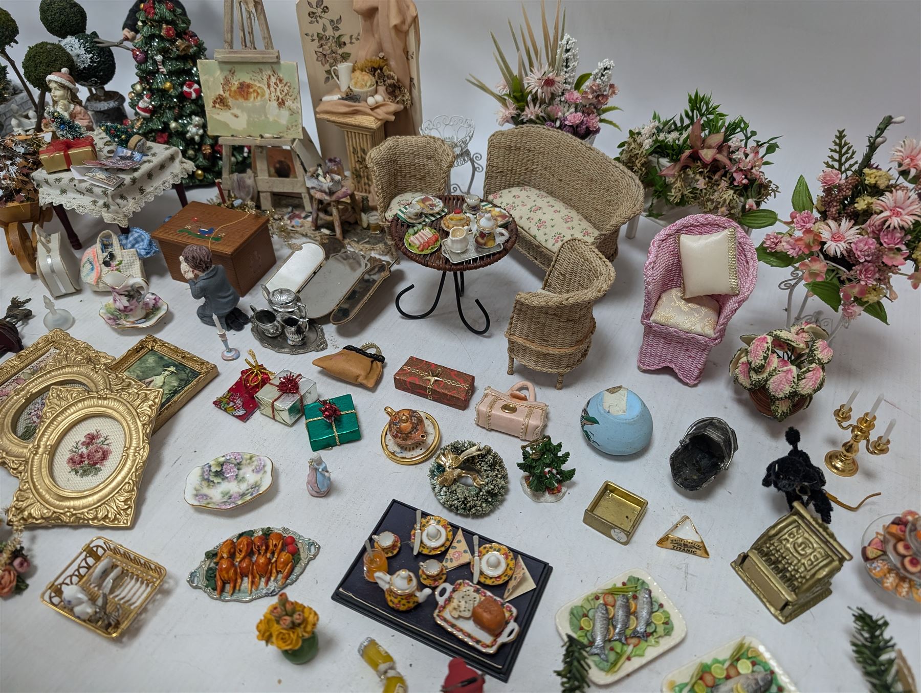 Dolls house conservatory and garden accessories, including sofa and chairs, trees, plants, paintings, Christmas decorations, etc 