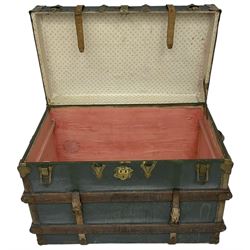 Early 20th century leather bound travelling trunk. teal leather exterior with oak strapping and gilt metal mounts, rectangular hinged top and twin carrying handles