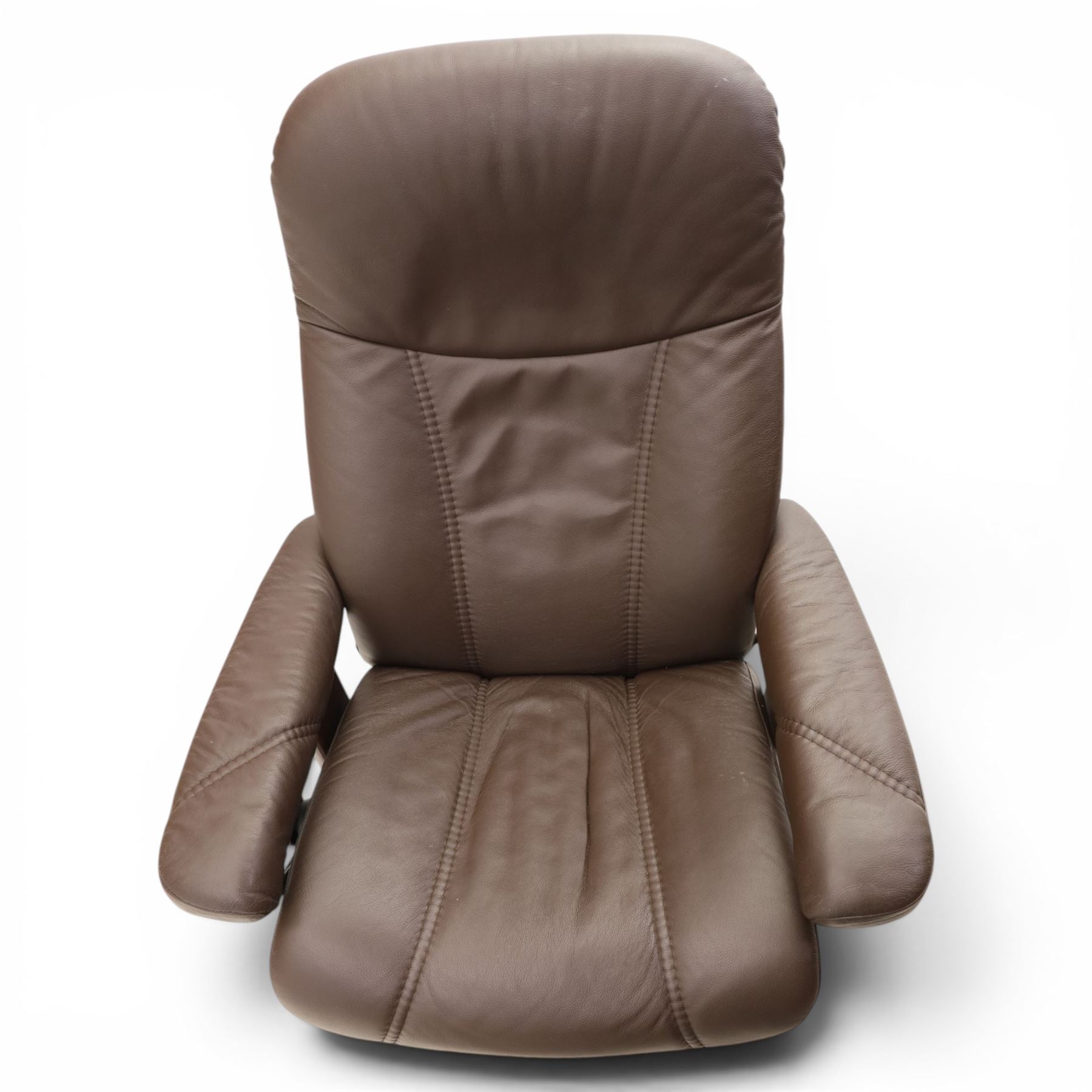 Ekornes - Stressless medium brown leather recliner swiveling armchair and stool, brown leather recline with stitching, together with a matching stool, on a round base