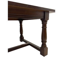 Large oak refectory design table, rectangular top on turned supports united by moulded H-shaped stretchers