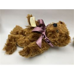 Group of five teddy bears comprising ‘George’ a unique pellet filled bear with glass eyes and velvet paws H38cm, and ‘Abbey’ a luxury German plush with wobble head and glass eyes no.5/10 H24cm, both with Teddies from Bearyland labels; along with two light blonde mohair H. M. Bears and Boyds Bears ‘T. F. Wuzzies’ no. 595140 (5)