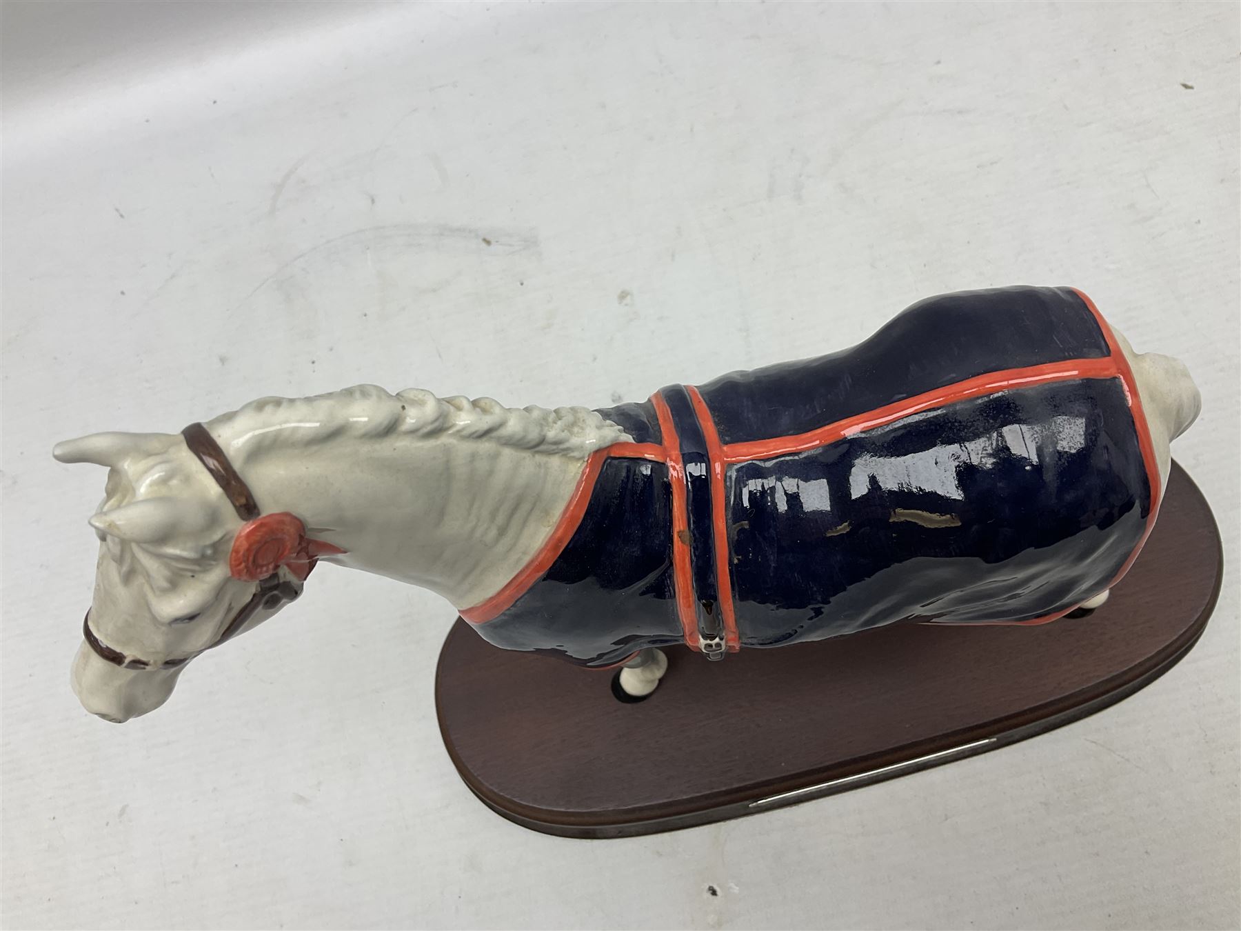 Beswick figure, grey Welsh Mountain Pony in a blue rug on plinth, no A247 H23cm