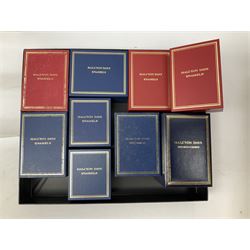 Eight Christmas themed Halcyon Days enamel boxes, and a Halcyon Days enamel bonbonniere modelled as a snowman, each in fitted box 