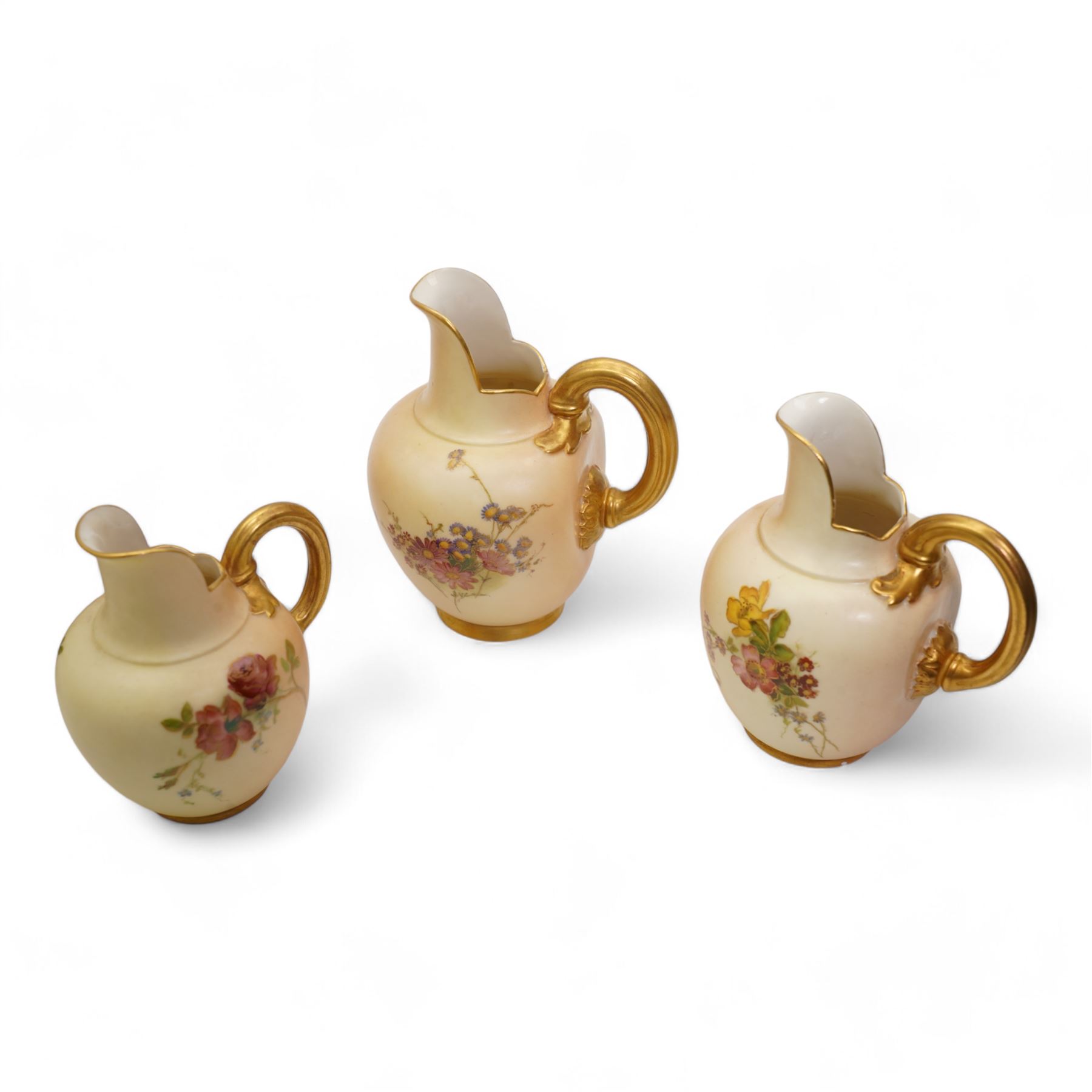 Royal Worcester blush ivory porcelain to include a pot pourri bowl with pierced cover, no. G935, ewer with winged beast moulded handle no. 1048, three further ewers, no 1094, shell shaped dish no. 1413 and two similar style leaf shaped dishes (8)
