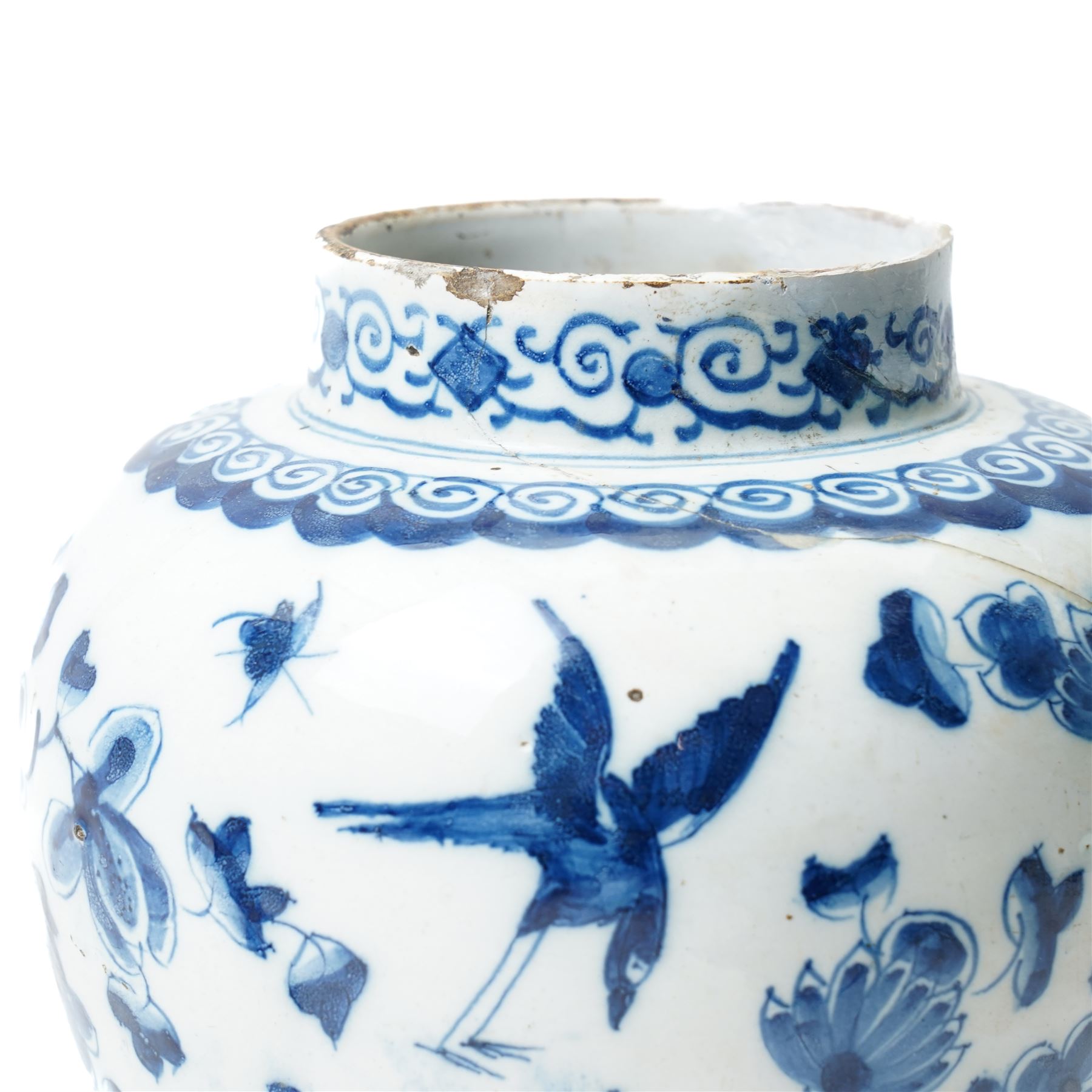 18th century Dutch Delft plate of fluted design decorated in blue and white with figures in a landscape D29cm and a Dutch Delft vase decorated in blue and white with oriental flowers H21cm (2)