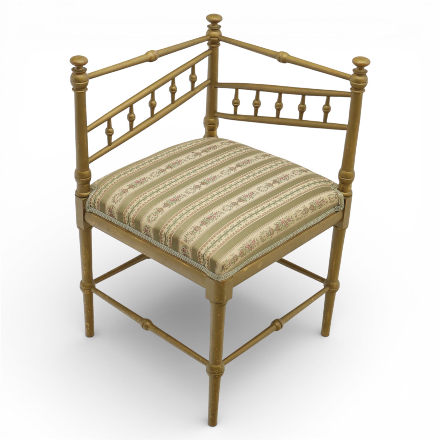 19th century Scandinavian corner chair, with rail back and sides formed with turned spindles and finial terminals, fitted with an upholstered seat in striped floral fabric, raised on turned supports united by stretchers