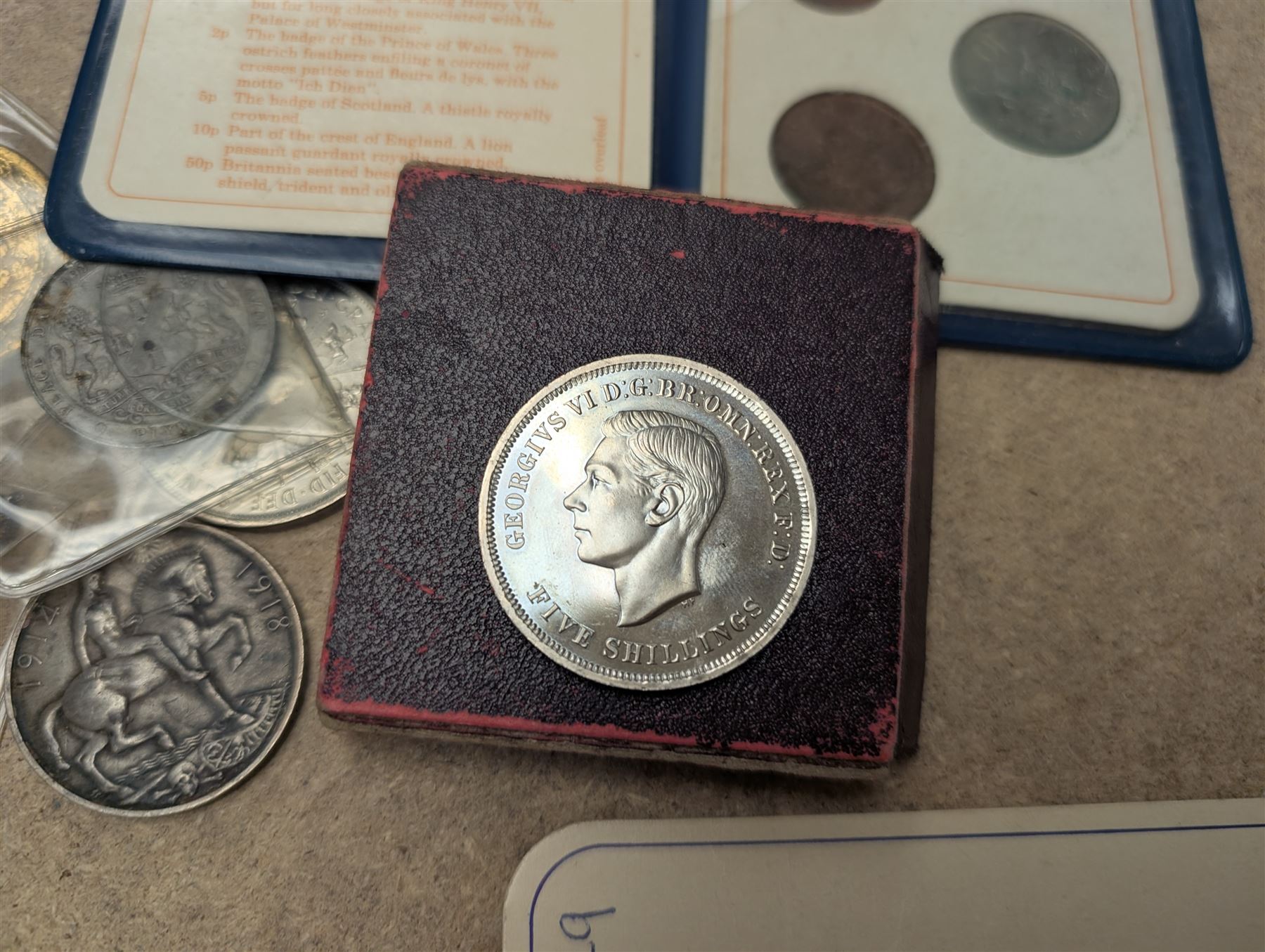 The Birmingham Mint International Formula 3 silver ingot, hallmarked, pair of sovereign scales, two silver fobs and others, etc and a collection of Great British coins