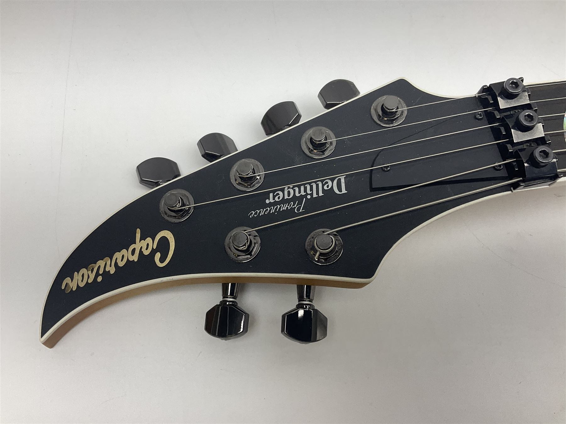 2015 Japanese Caparison Dellinger Prominence hand made boutique rock guitar in spectrum blue with clock inlays and Scaller tremolo; serial no.3200018; L100cm; in fitted case with certificate, registration card, tools etc