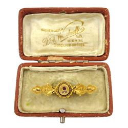 Victorian gold garnet and diamond brooch, stamped 15ct, boxed