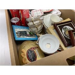 Group of assorted collectables, to include tea set for six with gilt decoration, Carlton Ware pin dish, African carved wooden figure group, limited edition Coca Cola bottles, three framed enamel of copper printed circular plaques, framed and glazed  E H Shepard print, etc., in one box 