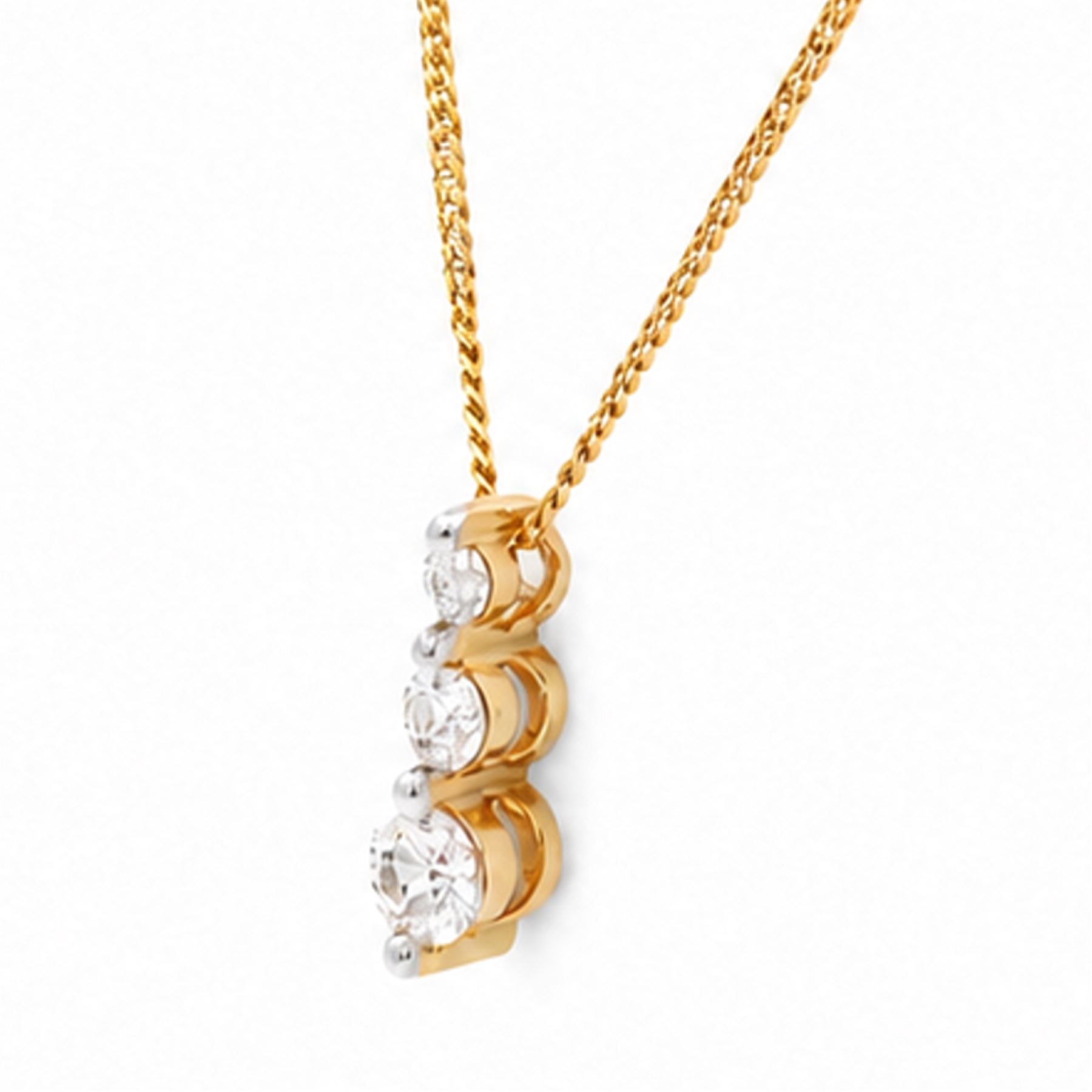 18ct gold diamond pendant necklace, set with three graduating round brilliant cut diamonds, total diamond weight 0.25 carat
