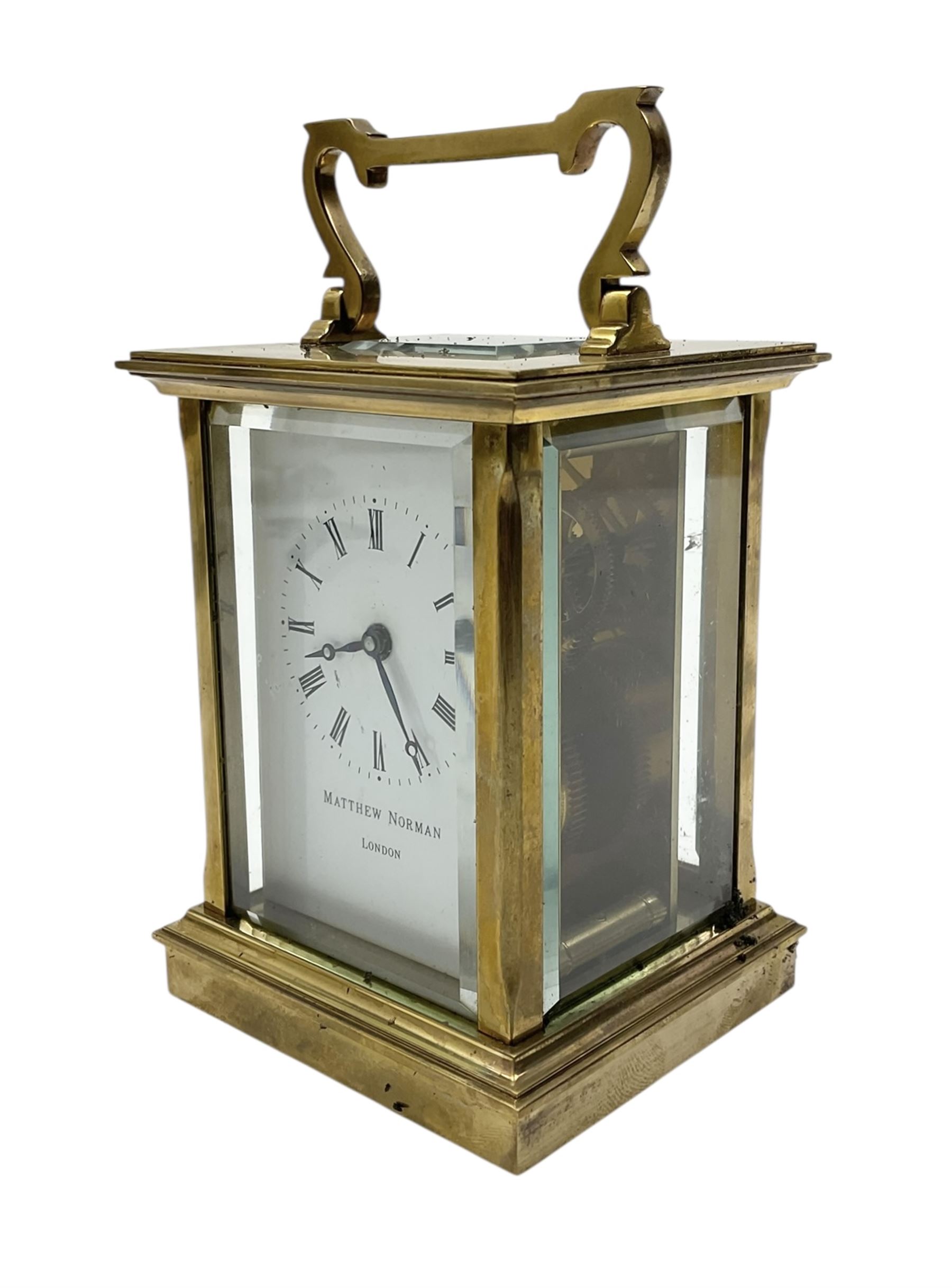 Matthew Norman-20th century brass cased carriage clock with an enamel dial, roman numerals and steel hands, single train timepiece movement with a lever platform escapement.