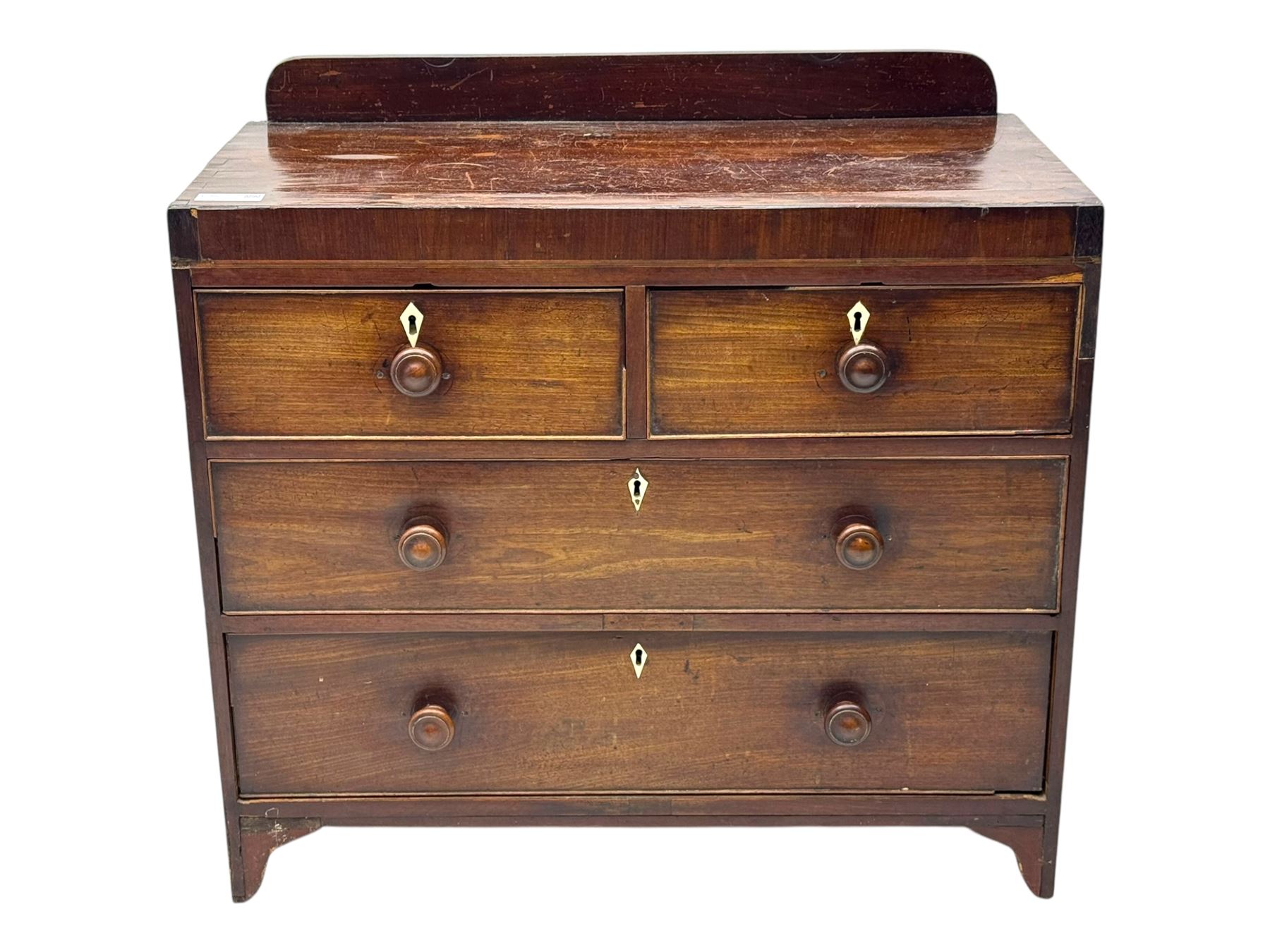 19th century mahogany chest, rectangular top with raised gallery back, fitted with two short and two long cockbeaded drawers, each with bone escutcheon, on shaped bracket feet