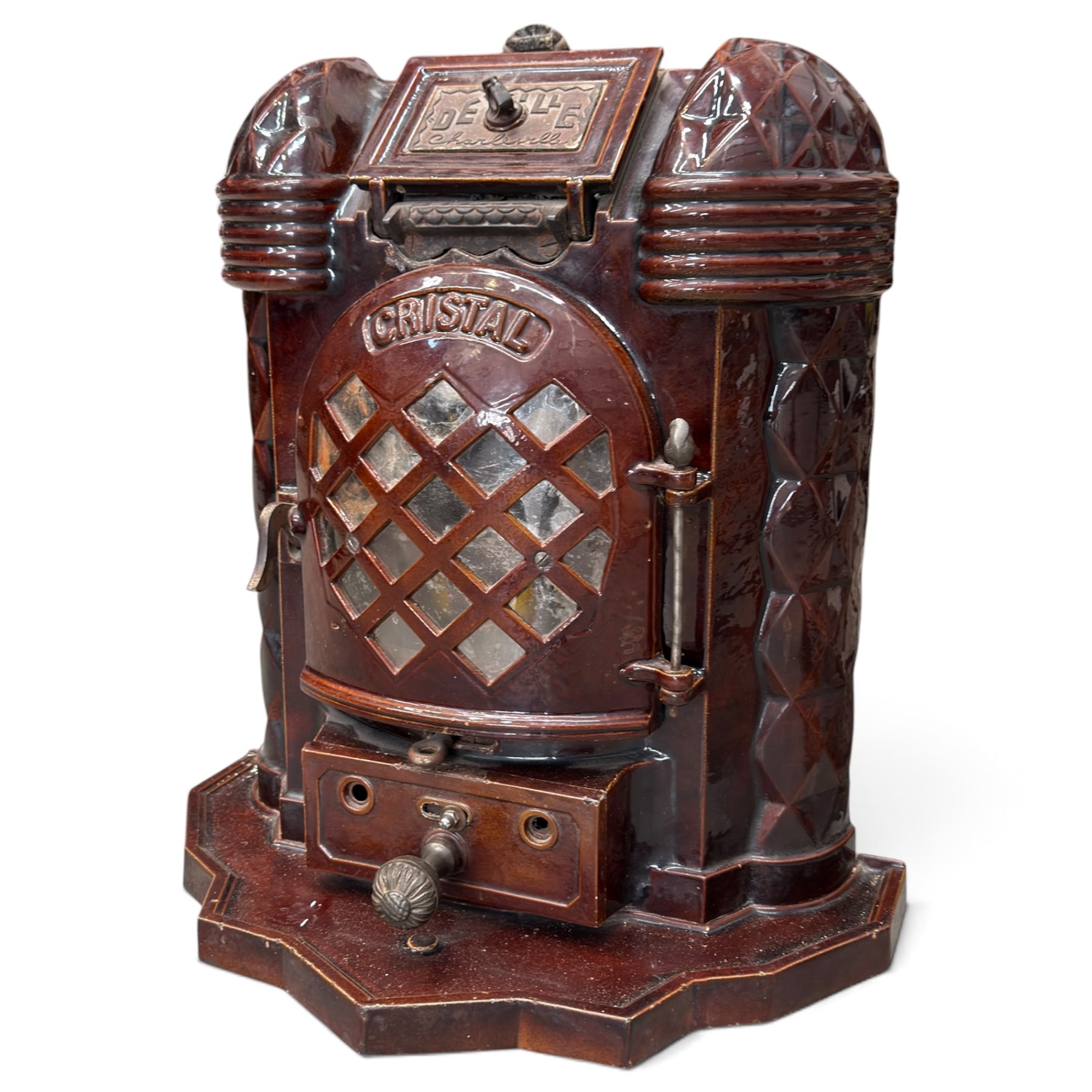 Deville & Cie of Charleville - early 20th century Art Deco cast iron and burgundy enamel 'Cristal' wood burning stove, hinged vent over lattice glazed door and ash drawer, on shaped geometric base, circa 1920