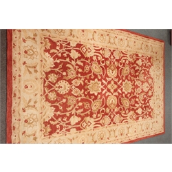  Large Persian style red ground rug, floral field,   