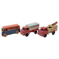 Wells Brimtoy/Pocketoy - eight tin-plate and plastic clockwork, friction-drive or push-along vehicles comprising Breakdown Service, Cement Mixer, Esso Tanker, Fire Tender, Removal Van, Builders & Decorators Van, open lorry and Express Delivery van; all unboxed (8)