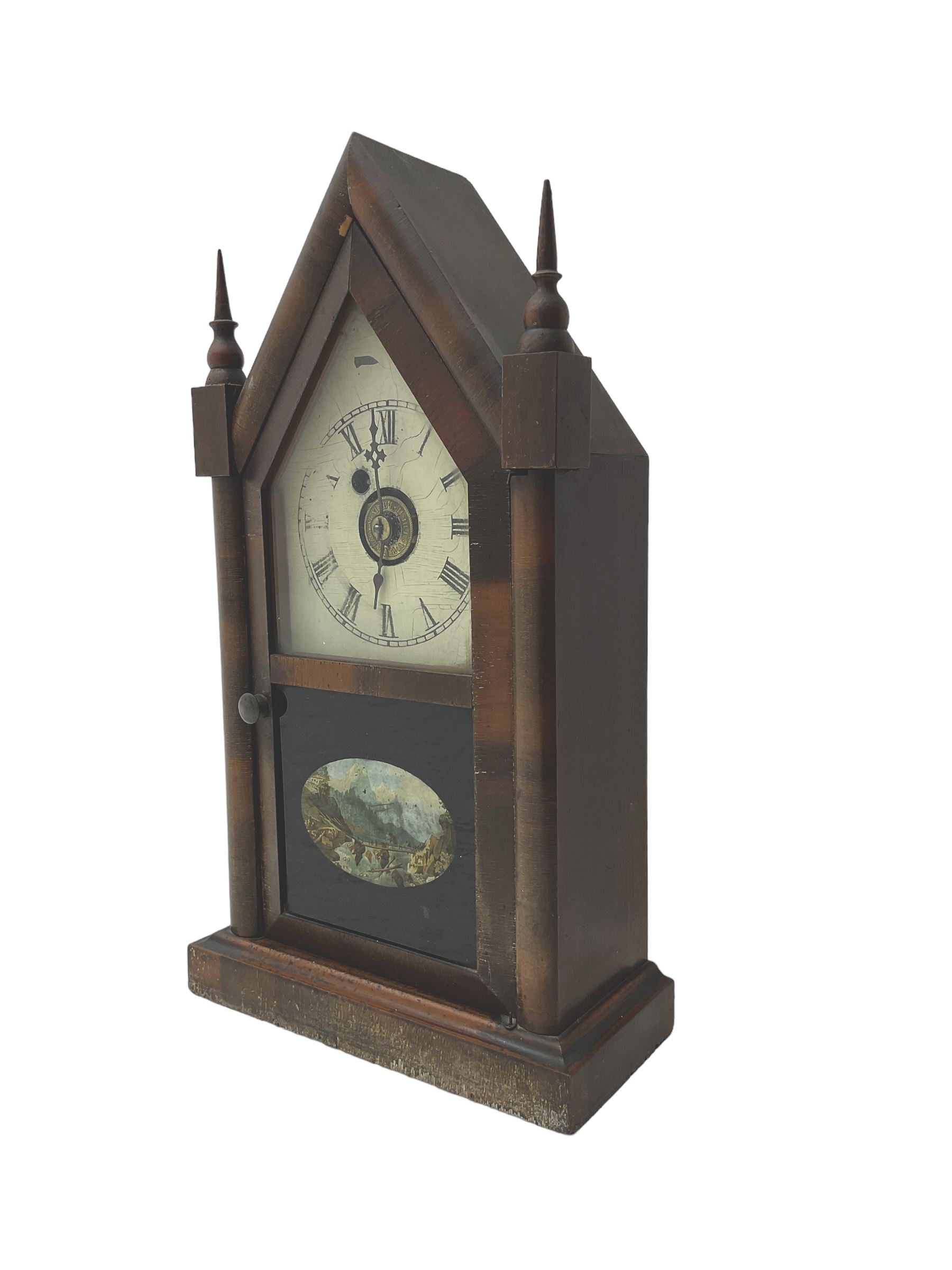 Late 19th/early 20th century American Waterbury Clock Company Gothic style mantel clock with 8-day movement and alarm facility striking on a bell H38cm